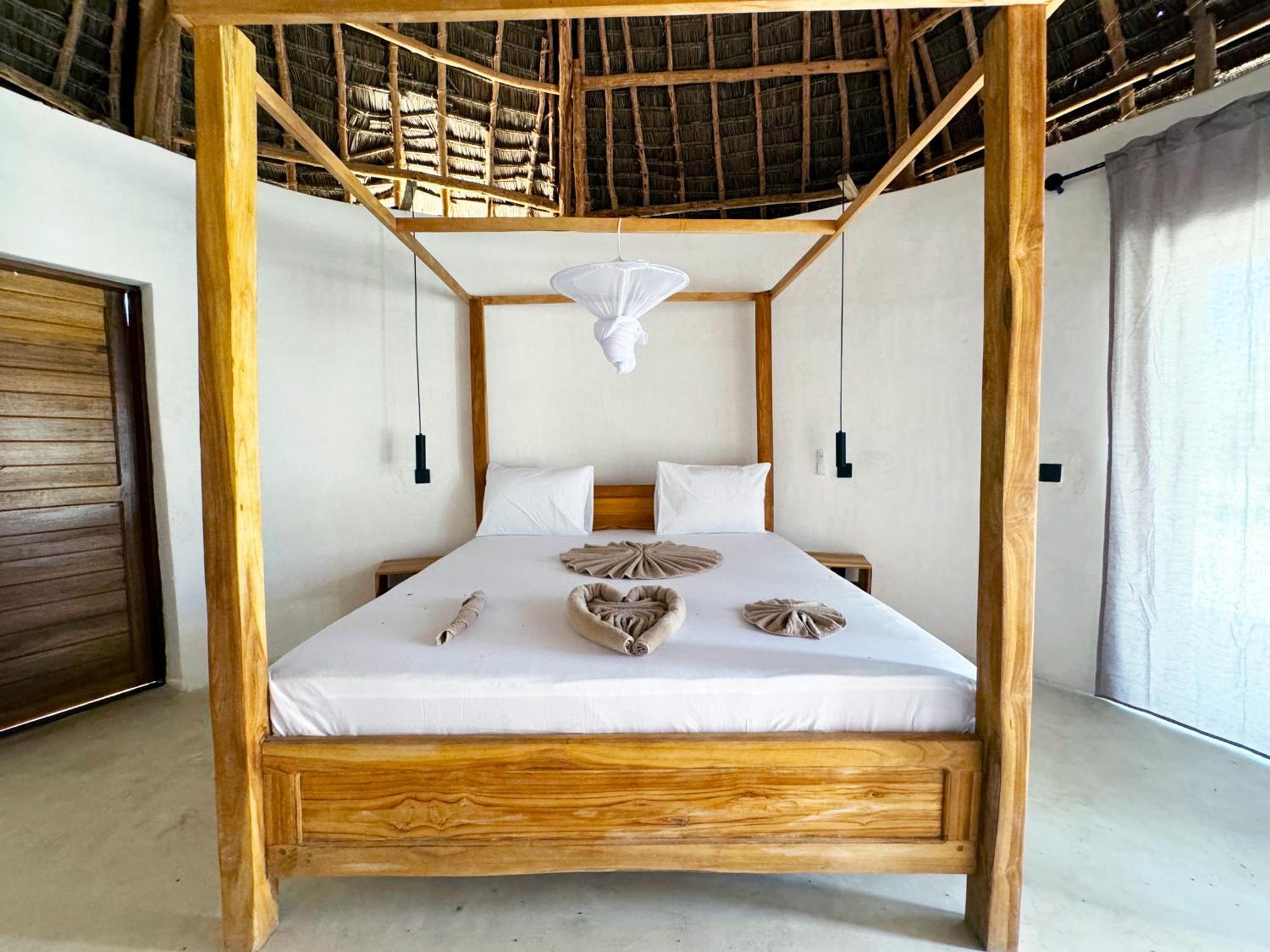 Garden Eden Lodge Джамбиани Экстерьер фото