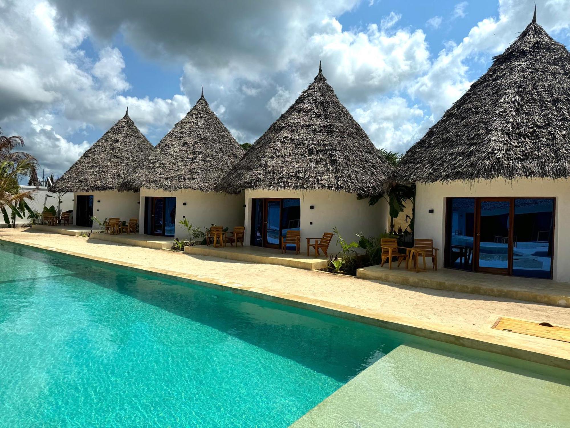 Garden Eden Lodge Джамбиани Экстерьер фото